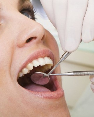 Patient receiving dental treatment